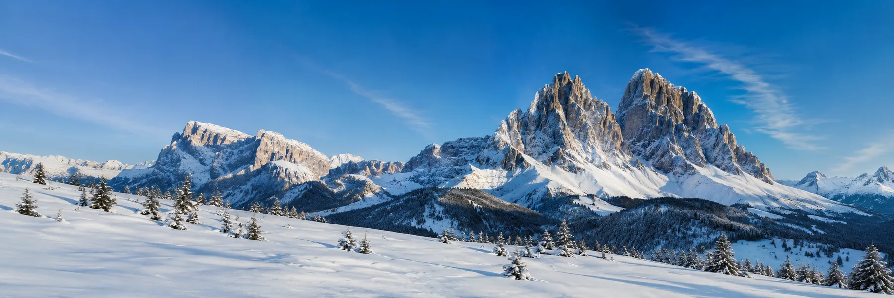A winter Dolomites ridge under clear alpine light